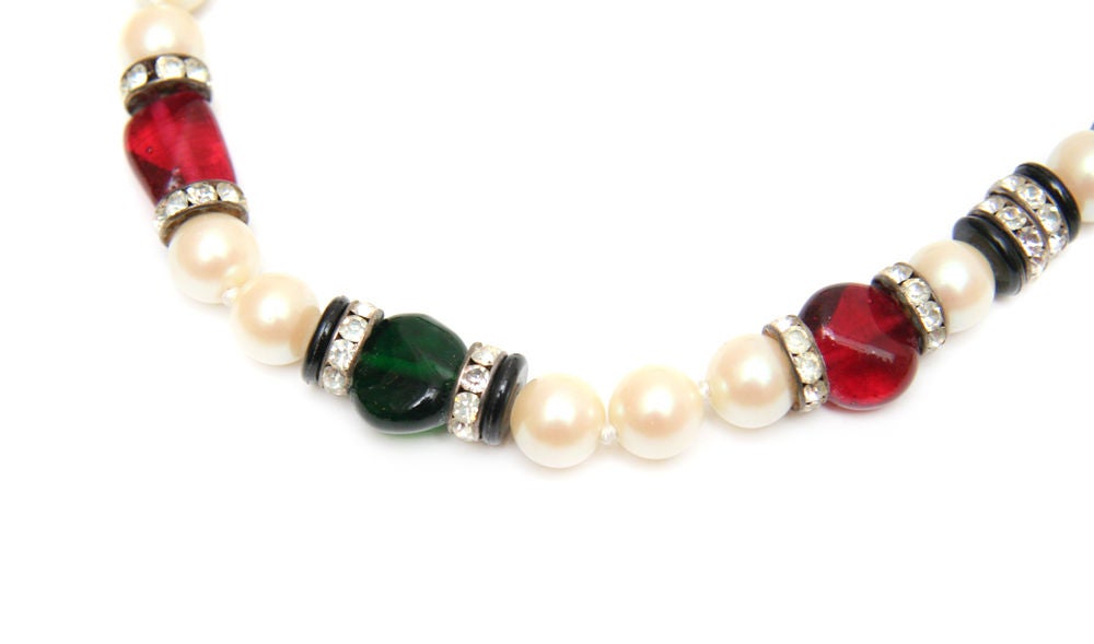 Long pearl and poured glass necklace with rondelle accents.