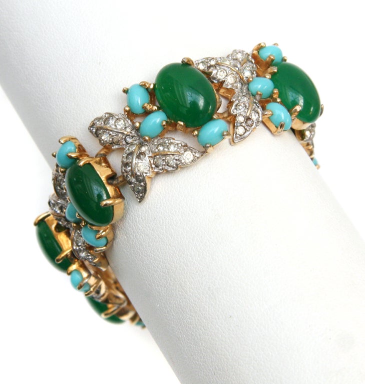 Signed Jomaz bracelet with green and turquoise cabochons and diamanté accents.