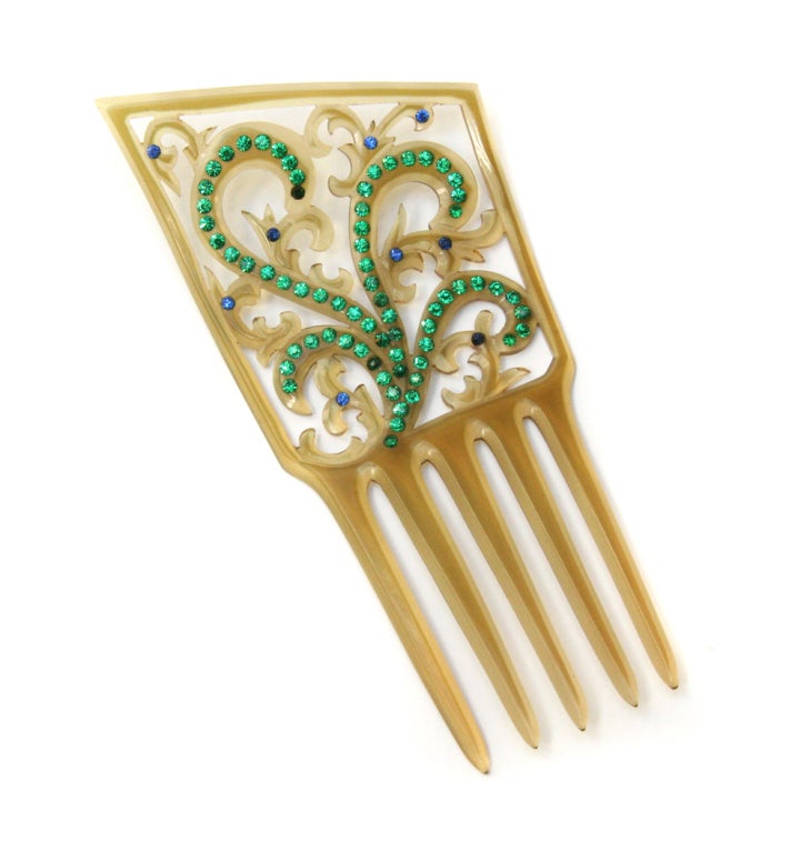 Apple juice carved celluloid hair comb with green and blue rhinestone.