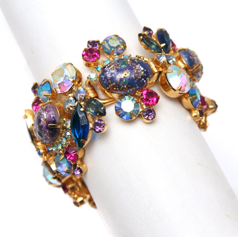 Juliana five link wide bracelet featuring blue Easter Egg stones accented by blue, fuchsia, purple, and aurora borealis rhinestones.