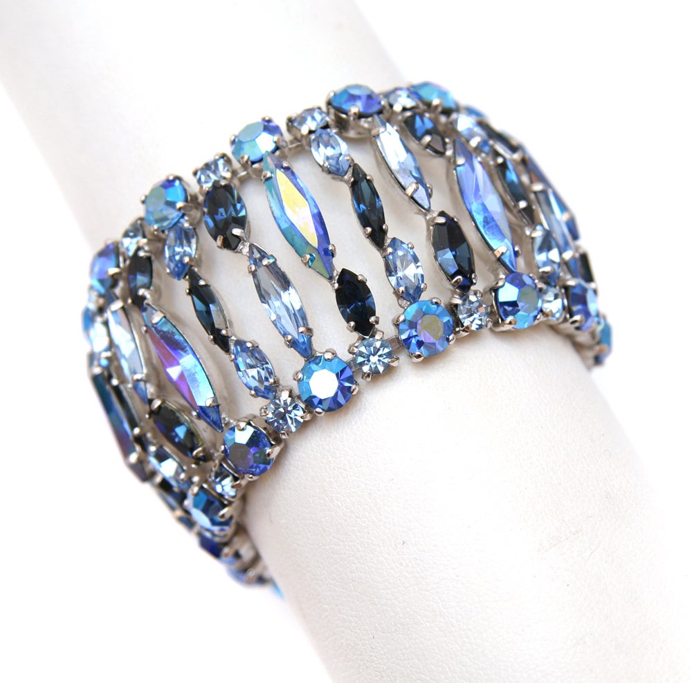 Sherman blue crystal bracelet with rhodium plated setting.