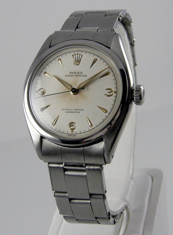 Rolex Oyster Pepetual from 1953, reference 6084.  In stainless steel with the original rivited bracelet.  The case is 34mm with a plastic crystal.