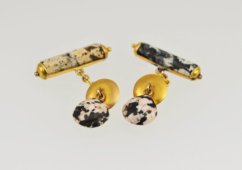 A pair of jasper and 18 karat yellow gold cufflinks from circa 1900.  A very cool and unusual set that are very wearable!

These cufflinks 1.75 inches in total length and 1.24 inches in width (at widest point). 