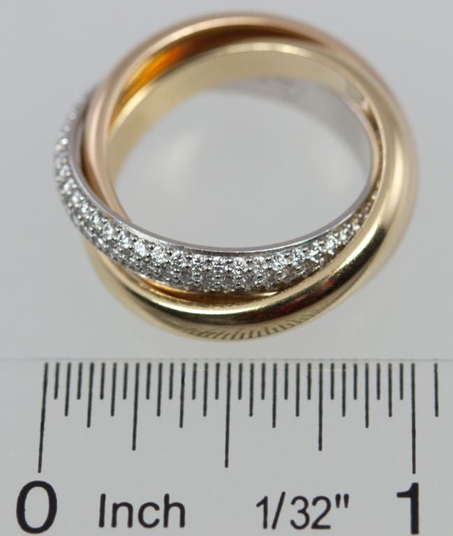 Contemporary Cartier Trinity Ring With One Diamond Band