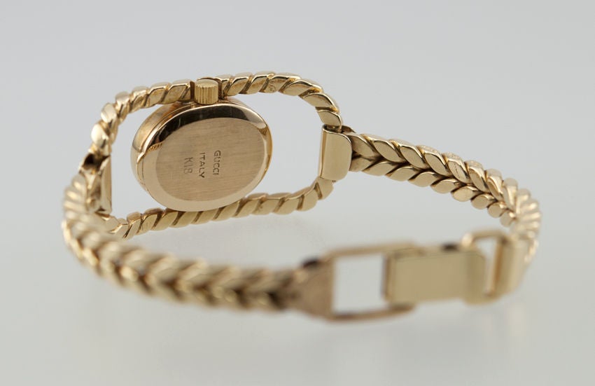Gold GUCCI Watch 1