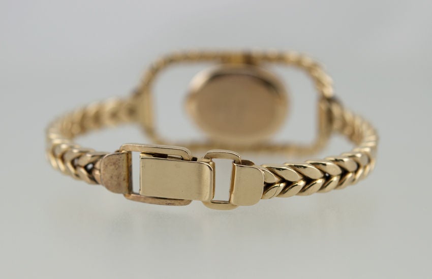 Gold GUCCI Watch 2