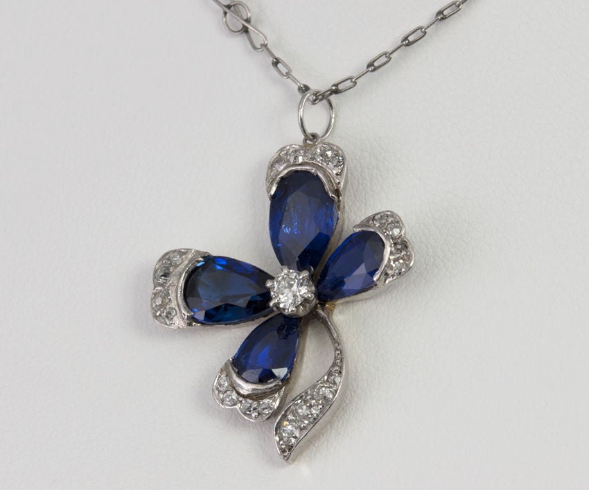 Victorian four leaf clover pendant in silver topped 18 karat yellow gold.  This beautiful pendant has 4 pear shaped sapphires, approximately 2.5 carats in total weight, surrounded by 0.50 carats of Old European Cut diamonds. Circa 1880s-1890s.

This