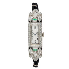 Lady's Platinum, Diamond, Onyx and Emerald Art Deco Watch Case Converted with Quartz Movement