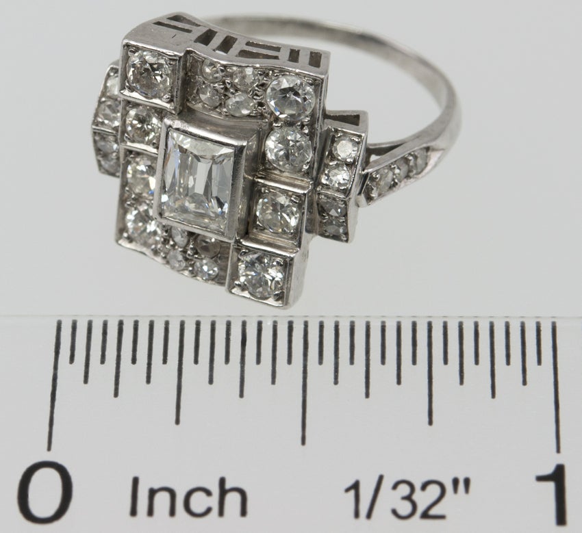 1930's Ring with Center Emerald Cut Diamond