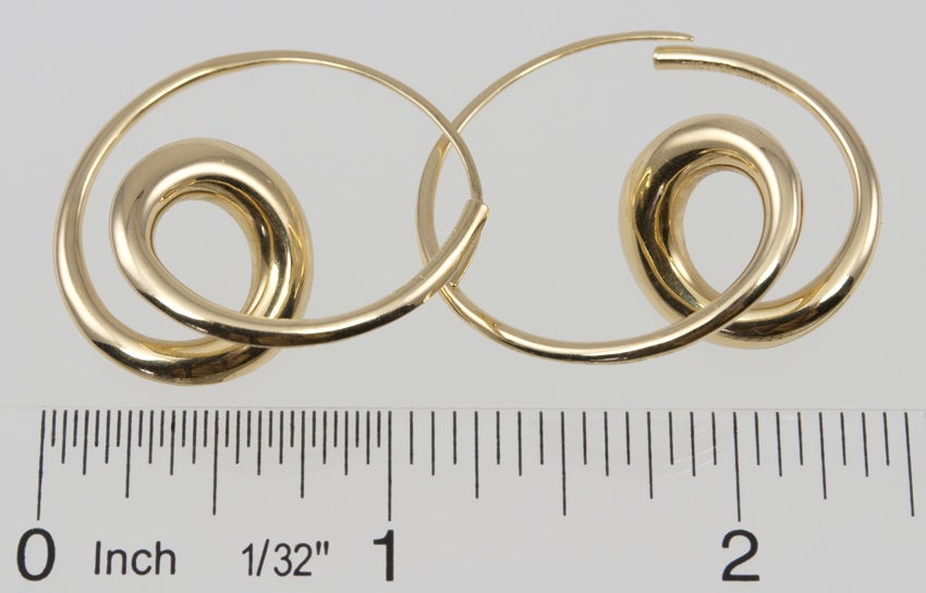 Sexy, twirly, stylized gold hoop earrings by Michael Good