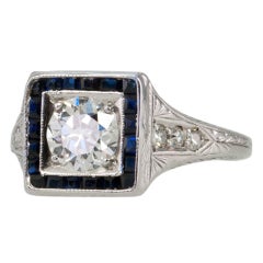 Diamond 0.65 Carat and Sapphire Ring Diamond 0.65 Carat and Sapphire Ring