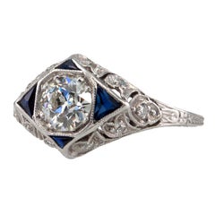 Engagement Ring with .64Ct. Diamond and Sapphires