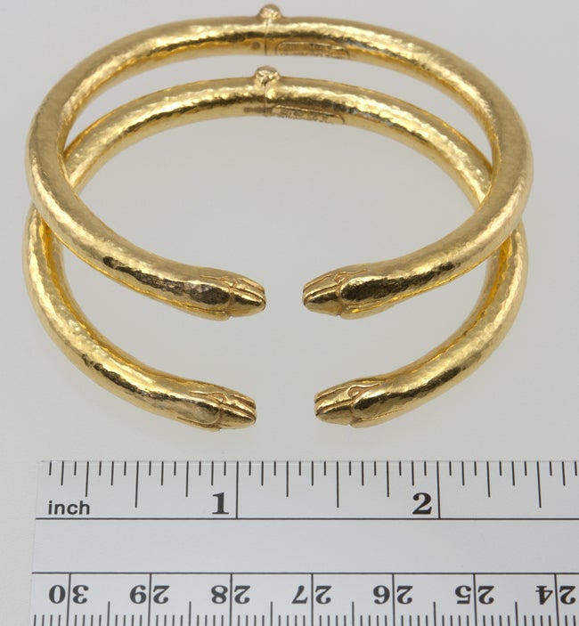 Great pair of LALAOUNIS snake bracelets.  They are 22k gold, with a hammered finish and a hinged back.  These will look stunning with a tan!