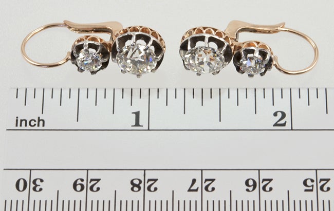 18k Rose gold and silver top lever back earrings.  The bottom diamonds are 1.64ct J-VS2 and 1.68ct K-VS2 respectively.  Both have GIA certificates.  The top diamonds are approximately .40ct each, for a total of approximately 4 carats! wow!