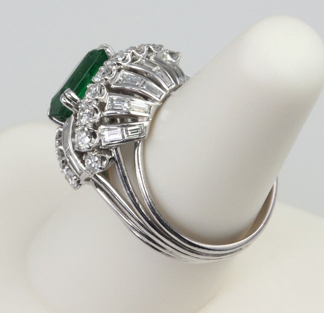 Women's Vintage 1950s Emerald and Diamond Bombe Platinum Cocktail Ring For Sale