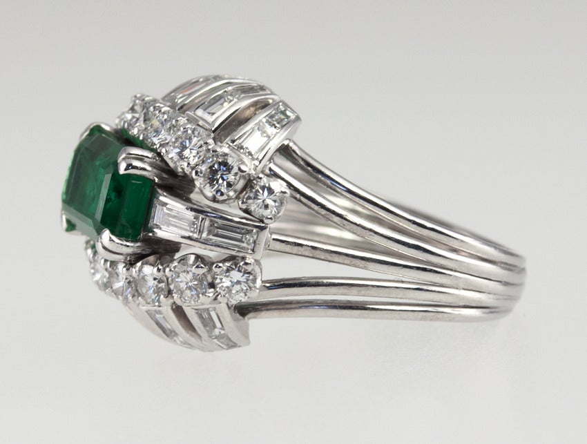Vintage 1950s Emerald and Diamond Bombe Platinum Cocktail Ring For Sale 1
