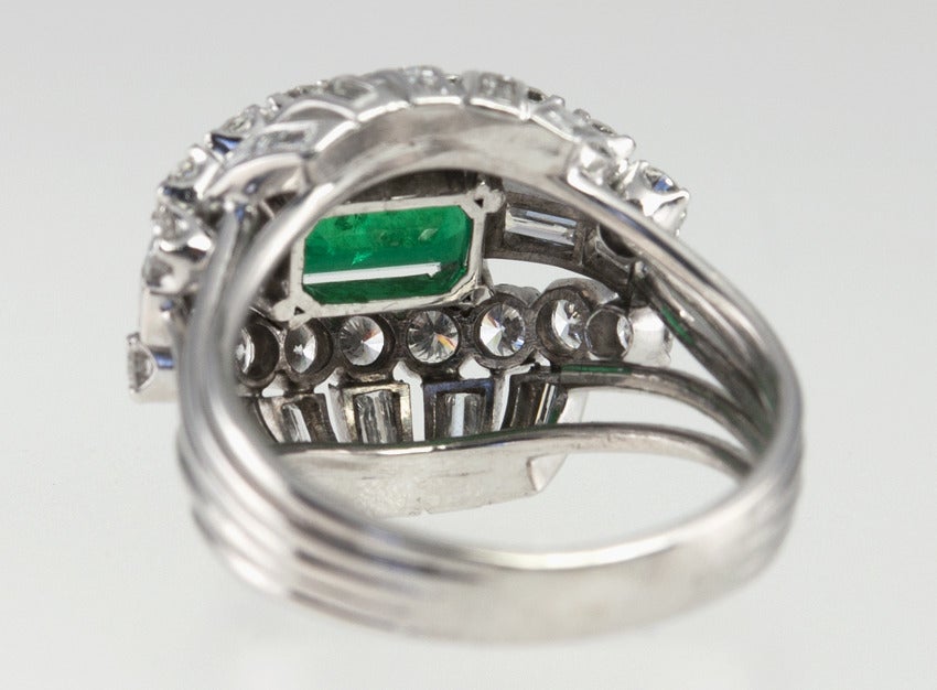 Vintage 1950s Emerald and Diamond Bombe Platinum Cocktail Ring For Sale 2
