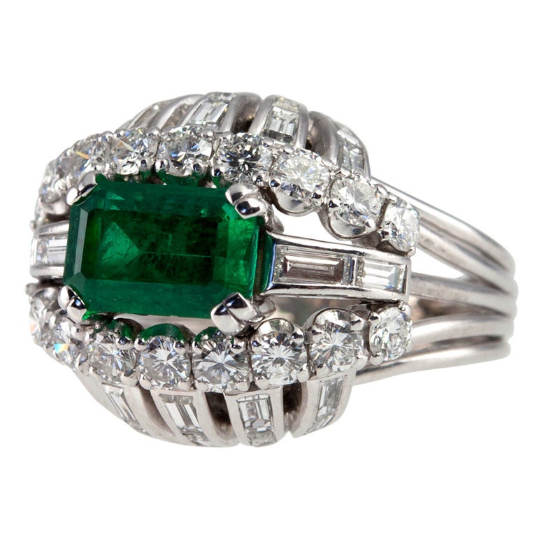 Vintage 1950s Emerald and Diamond Bombe Platinum Cocktail Ring For Sale