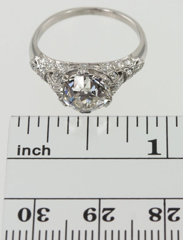 A gorgeous vintage ring from circa 1920.  The mounting has tons of detail, and is filled with single and full cut diamonds,even the six prongs!  The center Old European Cut diamond is 2.19 carats H in color VS1 in clarity (per EGL certificate).