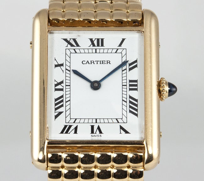 Women's or Men's Cartier Yellow Gold Men's Classic Tank on a Gold Bracelet