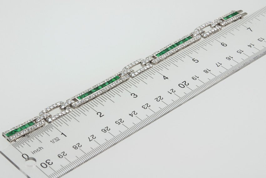 Great late Art Deco emerald and diamond bracelet. There are six carats of beautiful diamonds and four carats of stunning emeralds. It is signed JE Caldwell, and has Oscar Heyman numbers 33256.
