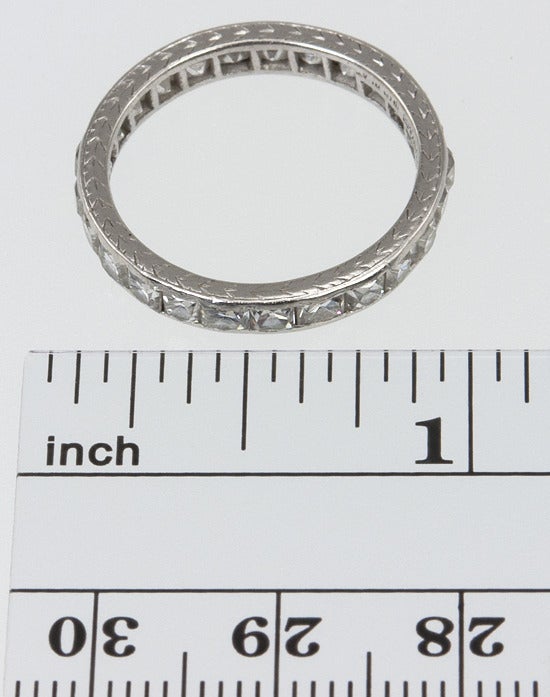 Platinum French cut diamond eternity band with 5 carats total weight, of big juicy french cuts!  Signed TIFFANY & CO, 
*This band is currently size 7 and CANNOT be re sized.