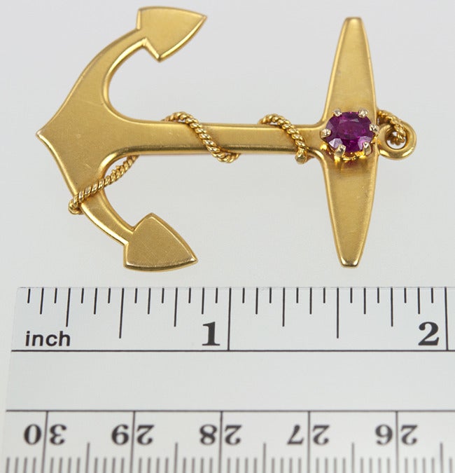 Anchors Aweigh! 14 karat Victorian Anchor Brooch with beautiful original bloom finish. It is set with a ruby approximately 0.75 carats.  Circa 1900.