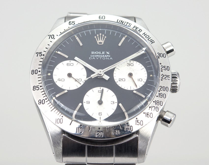 Rolex stainless steel Daytona chronograph wristwatch Ref. 6239, circa 1968.  Manual-wind movement, black dial, baton hands, stainless steel bezel, 36mm case. This watch includes a one year warranty from the time of purchase for accurate timekeeping.