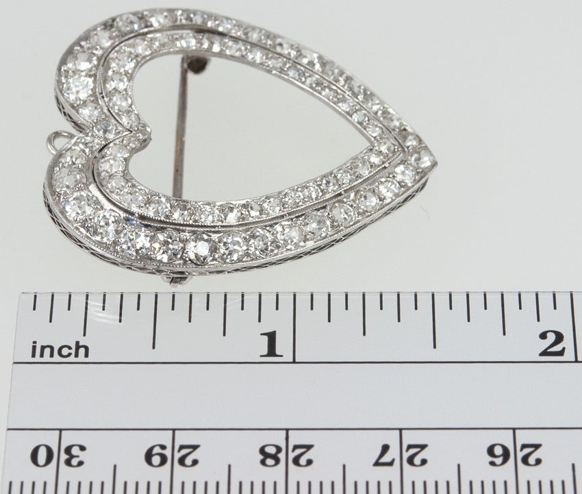 Double row Diamond Heart Pin or Pendant.  This sentimental item has 6 carats of Old European cut diamonds set in Platinum.