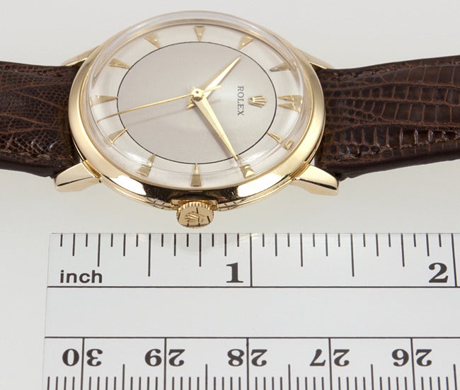 Rolex 18k yellow gold manual-wind wristwatch, circa 1950s. 33 X 36 mm case with extended lugs and beautifully restored dial with applied dagger indexes and large dauphine hands. Manual-wind movement with sweep seconds and Rolex crown. Great looking