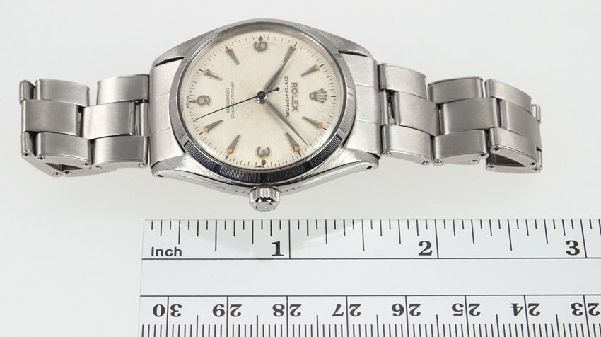 A beautiful example of a stainless steel Rolex Oyster Perpetual wristwatch, circa 1964, Ref. 6565, 34mm. Original dial with light crazing, automatic movement, engine turned bezel.