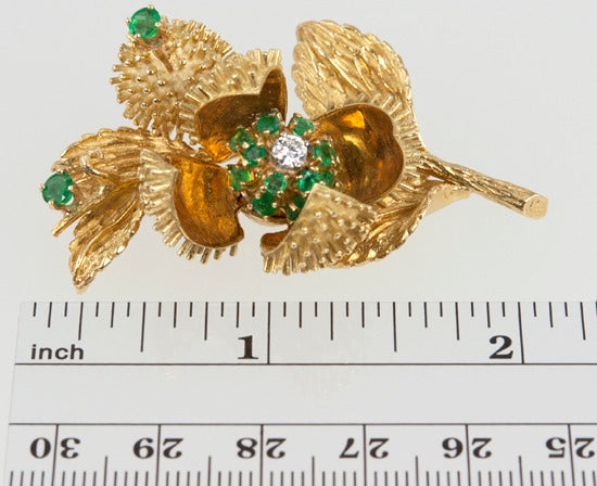 Tiffany Thistle Brooch and Earrings set with emerald and diamonds.  The earrings are clips but it wouldn't be difficult to add a post.