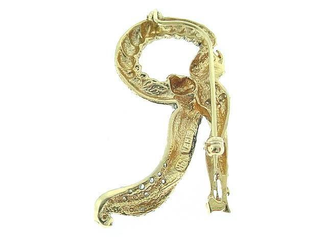 This is a gorgeous initial  pin  by  ERTE    CFA . .<br />
The  subject is the letter R . .The image is a woman with flowing costume that features diamond accents