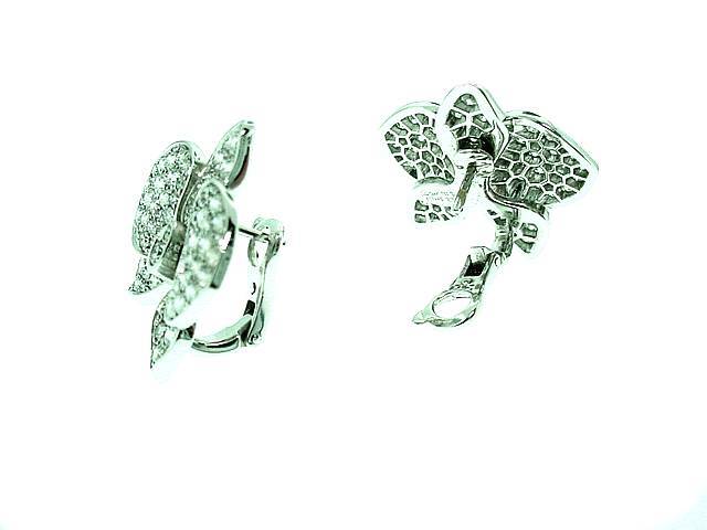 An  exceptional pair of CARTIER  diamond  earrings from the  Orchidee  collection. . .These are in the current line and feature  2.89cts of fine diamonds. . .signed and numbered with certification papers
Cartier makes orchid earrings in several