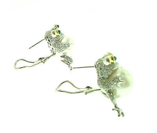 This is a pair of adorable diamond frog earrings. . .by TIFFANY & COMPANY. . .featuring a pair of exceptional 12.4mm white pearls. . .eyes are emeralds. .These were made in limited production. 
Signed  