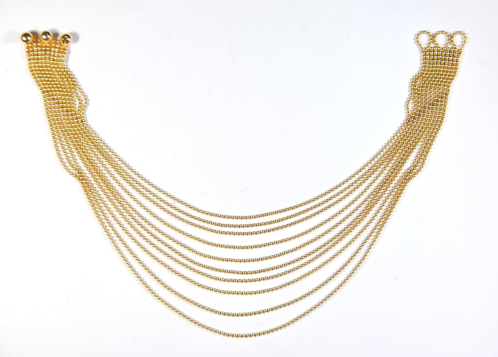 Simple elegance! Gorgeous, fluid Cartier 18K yellow gold 10 strand 