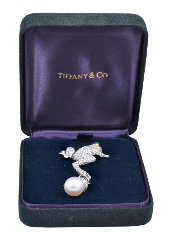 Fabulous and very rare, this gorgeous Tiffany platinum, diamond and South Sea pearl can be your new signature piece.  It is the Leap Frog brooch from the 1996-1997 Nature Collection, pave set with 241 brilliant cut diamonds, weighing approximately