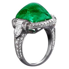 Superb sugarloaf emerald and diamond ring.