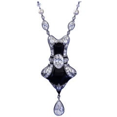 Art Deco natural oriental pearl, diamond and onyx necklace.