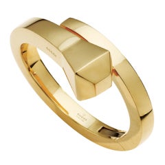 Gold bangle bracelet by Gucci