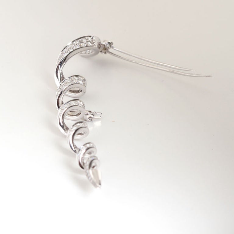 VAN CLEEF & ARPELS Swirl Diamond and Platinum Brooch