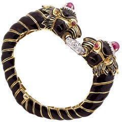 DAVID WEBB Rare Confronting Lions Gold & Black Enamel Bangle