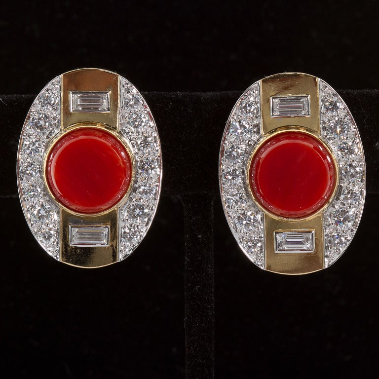 DAVID WEBB platinum and 18k yellow gold diamond and coral ear clips.
1-1/8 inches H x 3/4 inches W. Approximately 4.50 carats of diamonds.

No. 5435
_
TMW Jewels Co. is a family owned jewelry boutique in the heart of New York City's jewelry