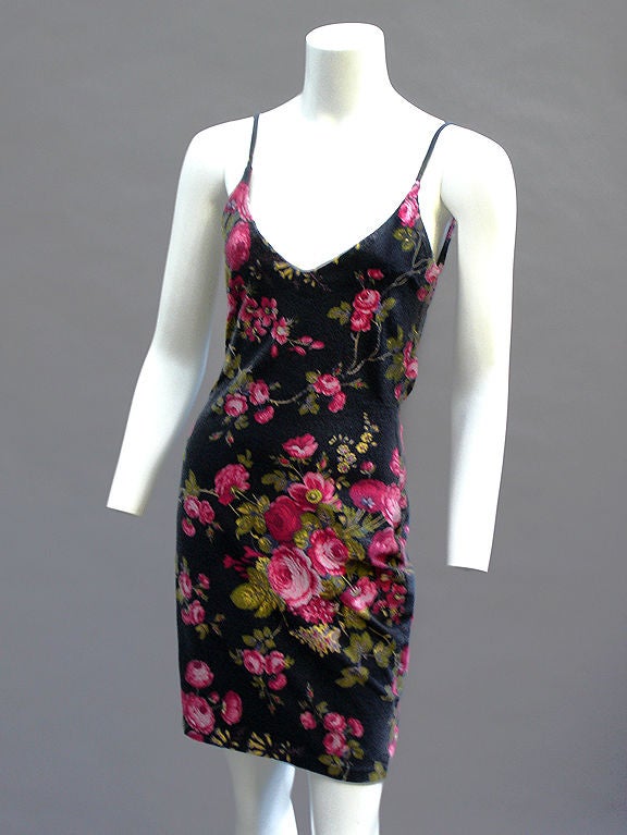 Lovely, clingy rose-print Betsey Johnson sundress. <br />
<br />
This dress is from the early 80s, shortly after Ms. Johnson started her eponymous line, and has one of our favorite Betsey Johnson labels--The 