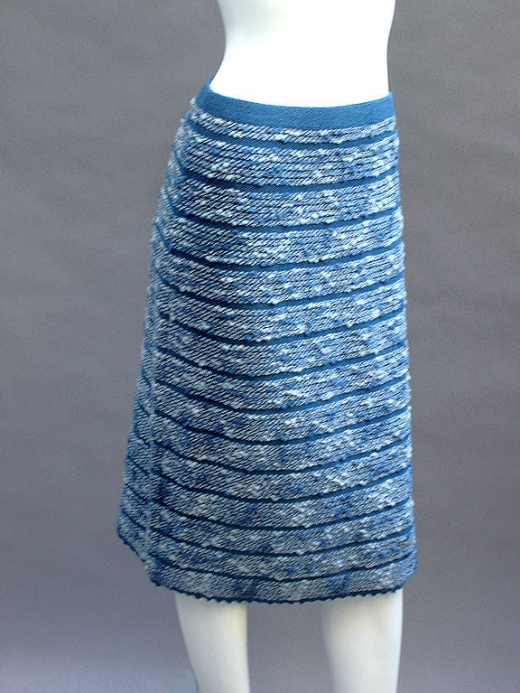 Santana knit Adolfo skirt in blue with touches of white. All the quality that you expect from an Adolfo. Thick and textured Santana knit. Elastic waist. Crocheted hem. A-line shape to the knee.

A must have for cooler weather; paired with high