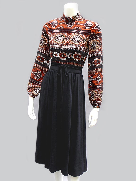 Never-worn Donal Brooks two-fabric dress. Floppy soft thin rayon top, mid weight stretchy knit jersey for the skirt. Beautifully made sleeves have gathers at the wrists. Two-inch waistband with a a thin black sash and four belt loops. Has its