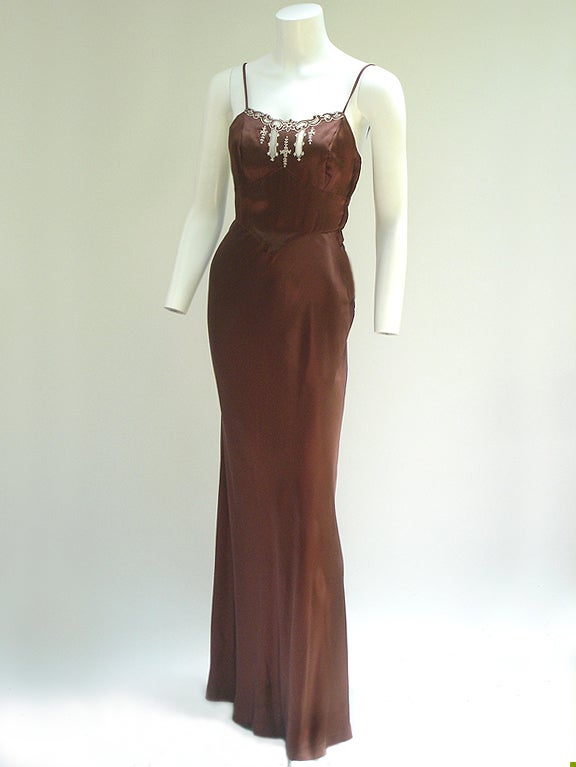 From THE Fantastic Early-70s Glam Period, 1970-72 . . . This Dress is Just So Beautiful . . .

Fabulous Retro 40s Movie Star Glamour is Evoked Through Out The Entire Design Of This Dress....GORGEOUS Unlined Satin - Cut At The Bais- For That