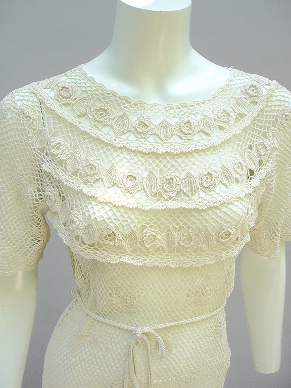 SOO BEAUTIFUL

SIZE ON LABEL S - 4/6
BUST MEASURED FLAT 34
LENGTH 44
100% COTTON
LABEL MIRAMAR
HAND CROCHETED KNITTED
SHANGHAI
NEVER WORN WITH ORIGINAL HANG TAGS
IN MINT CONDITION
CIRCA 70S