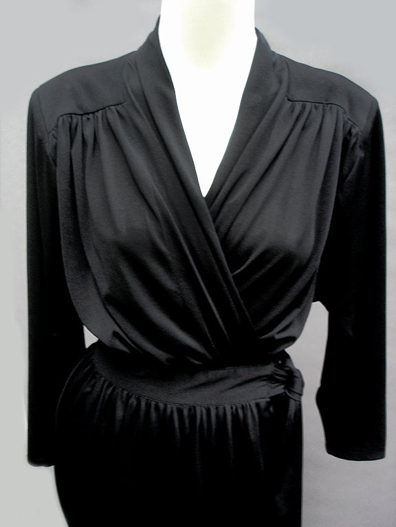 FABULOUS BLACK WRAP DRESS - LOVE THE BIT OF KIMONO-ISH DETAILS - PADDED SHOULDERS AND DOLMAIN SLEEVES ( SHOULDER PAD CAN ALWAYS BE SNIPPED OUT ) LOVELY SHAWL COLLAR AND GATHERED SHOULDERS FRONT AND BACK... BACK IS OUT STANDING- THIS IS A TUE WRAP