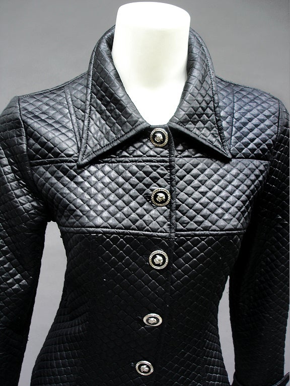 Sexy little Gianni Versace black jacket. LOVE the 5 Medusa heads Buttons - in silver and black hardware...Jacket is unlined - Fab quilted look ... This jacket is light as a feather- *has a small run in the fabric at the 4th button hole ( like a run